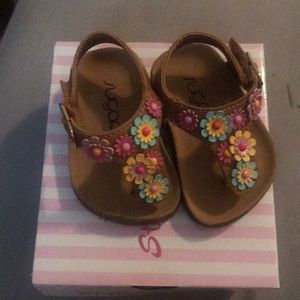 Infant flower sandals.